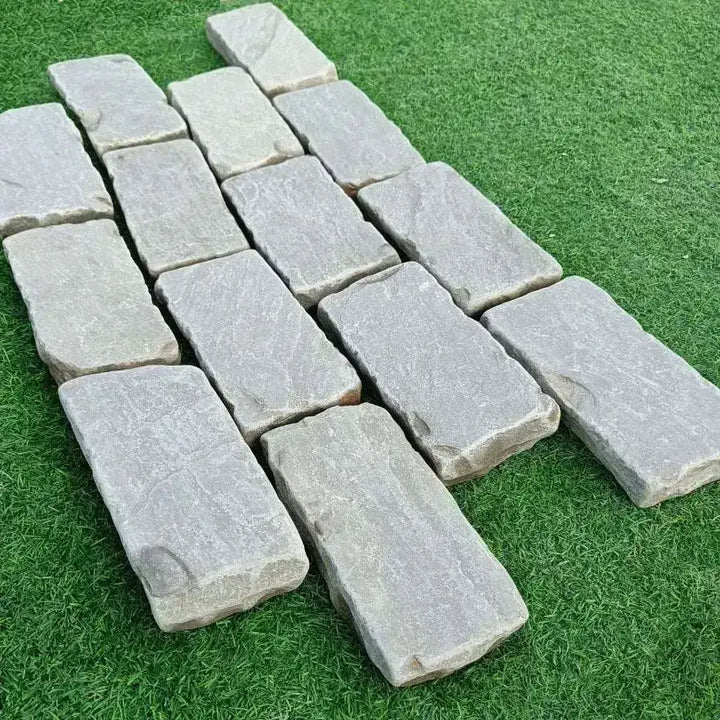 tumbled Kandla grey sandstone cobble setts 200x100x50