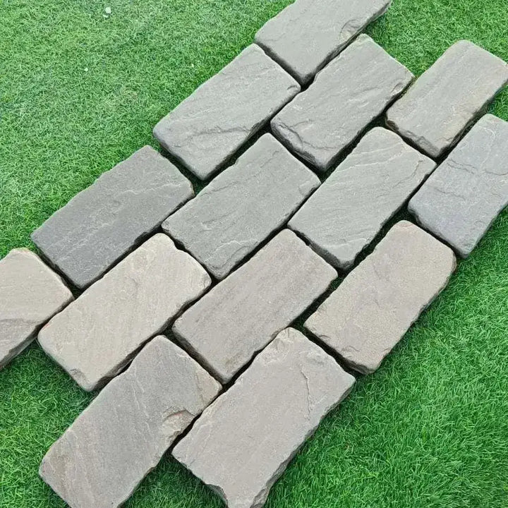 Kandla grey sandstone tumbled cobble setts 200x100x50